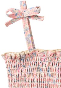 Haut en tissu à motifs floraux aux couleurs rose, bleu et crème. Comprend des bords à volants et une bretelle nouée en nœud. Détail froncé texturé.