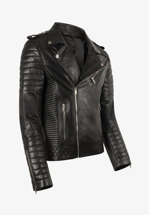 Black leather motorcycle jacket with quilted shoulder and side panels. Features silver zippers and snap buttons. Asymmetrical front closure.