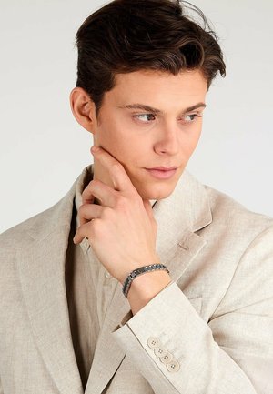 Bracelet - zilveren kleur