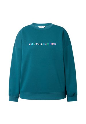 Türkises, oversized Sweatshirt aus weichem Stoff mit einer Reihe von bunten, edelsteinähnlichen Applikationen über der Brust sowie Rippbündchen und -saum.