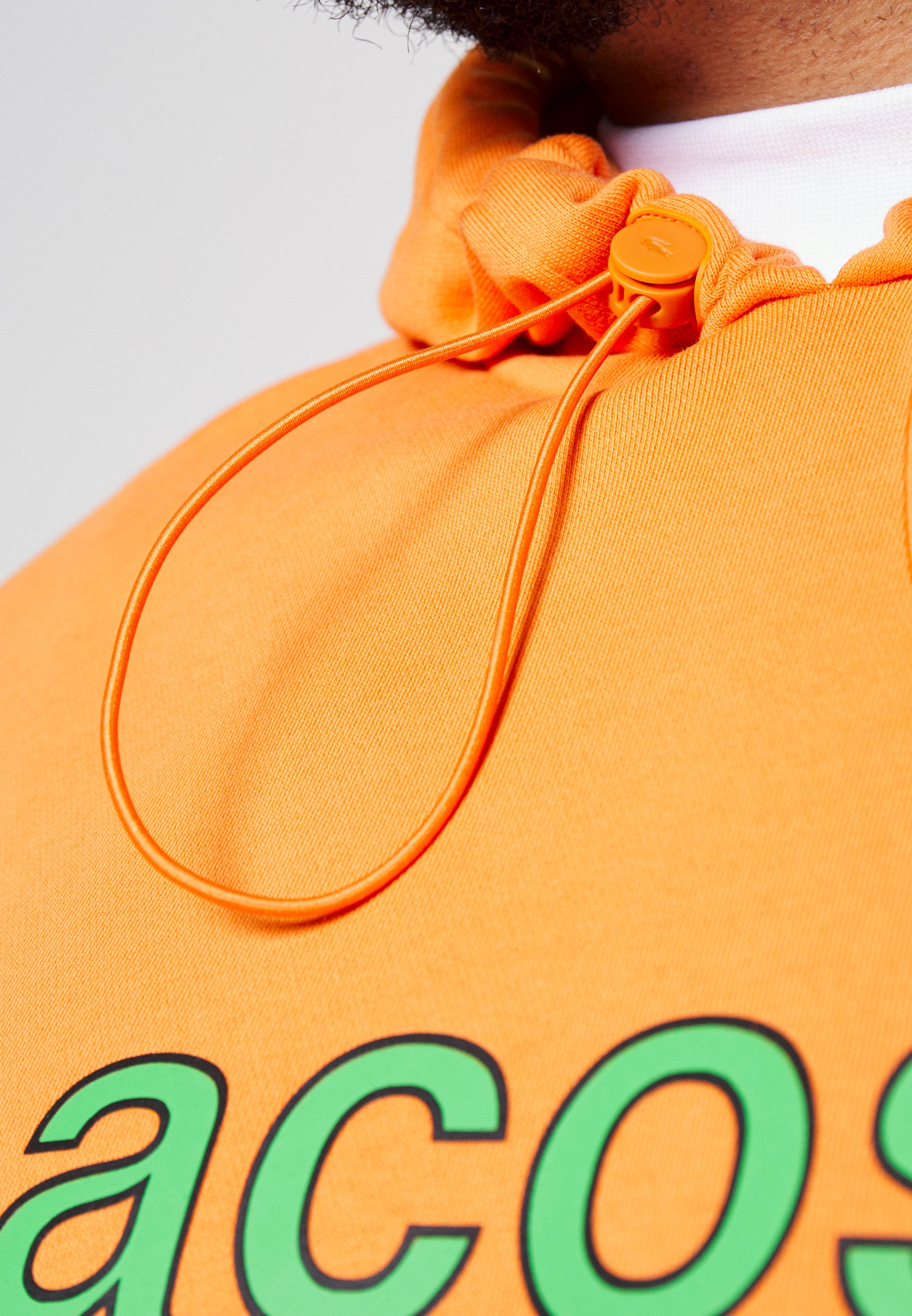 sweat lacoste orange
