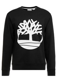 Felpa nera con maniche lunghe, caratterizzata da un grande logo bianco a forma di albero sul davanti. Realizzata in un tessuto morbido con polsini e orlo a coste.