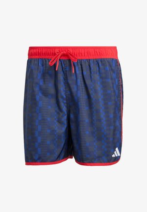 Costumi da bagno con un motivo geometrico blu, cintura elasticizzata con coulisse rossa e rifiniture rosse. Include il logo Adidas sull'orlo.