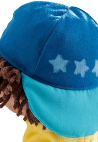 Soft toy featuring a blue and turquoise cap with star patterns, brown textured hair, and a yellow shirt. Smooth fabric, colorful design.