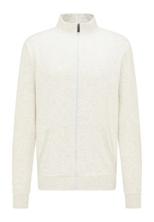 Lichtbeige jas met volledige ritssluiting, opstaande kraag, lange mouwen, voorzakken en geribde boorden en zoom.