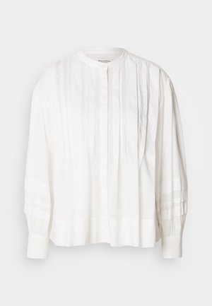 Blusa blanca con un escote redondo, cierre de botones y pliegues verticales. Mangas largas con textura recogida, fabricada en un tejido ligero.