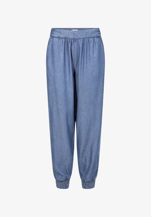 Šviesiai mėlynos džinsinės jogger kelnės su elastine juosmena, šoninėmis kišenėmis ir surinktais rankogalviais, užtikrinančiais laisvą prigludimą. Minkšta tekstūra.