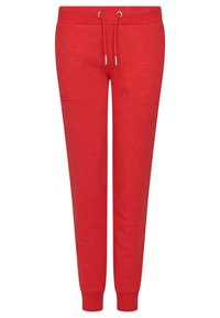 Red jogger pants with drawstring waist and cuffed ankles, made of soft fabric, featuring subtle embroidered logo on left thigh.
