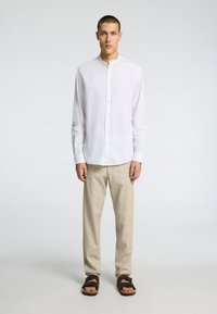 Selected Homme SLH BRODY NOOS - Chino stiliaus kelnės - vetiver