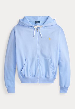 Jasnoniebieska bluza z kapturem zapinana na zamek, z przednimi kieszeniami, białym sznurkiem, ściągaczami na mankietach i dole oraz małym żółtym logo Polo Ralph Lauren na piersi.