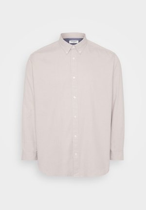 Chemise à manches longues gris clair, à boutons, avec un col classique, fabriquée en tissu doux, dotée d'une patte de boutonnage sur toute la longueur et d'un ourlet arrondi.