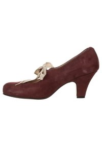 Scarpa con tacco alto in suede bordeaux con punta tonda, caratterizzata da un elegante fiocco beige decorativo sul davanti e un tacco curvo.