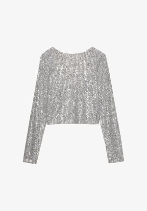 Zilveren langemouwen cropped top met een textuur, voorzien van een patroon van kleine pailletten voor extra glans en visuele aantrekkingskracht.