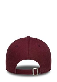 Back view of a maroon baseball cap with adjustable fabric strap and metal buckle on a white background.