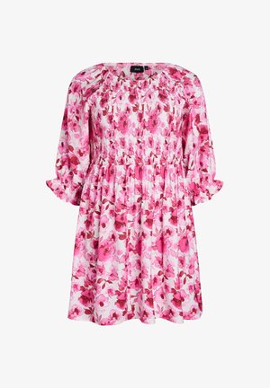 Pink and white floral knee-length dress with three-quarter puff sleeves, smocked bodice, and gathered waist.