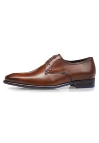 Brown leather dress shoe with a smooth finish, slightly pointed toe, and minimal stitching. Features a textured accent on the side.