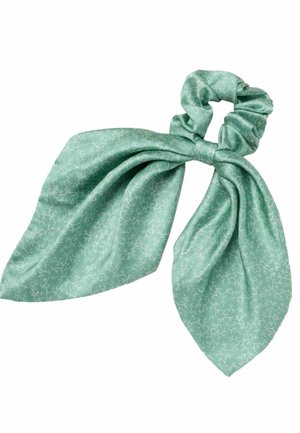 Mintgrøn stofscrunchie med lange, spidse, løst bundne båndender og et subtilt hvidt forgrenet mønster.