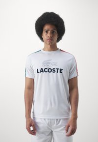 Lacoste Sport T-Shirt sport - white/hydro sierra red