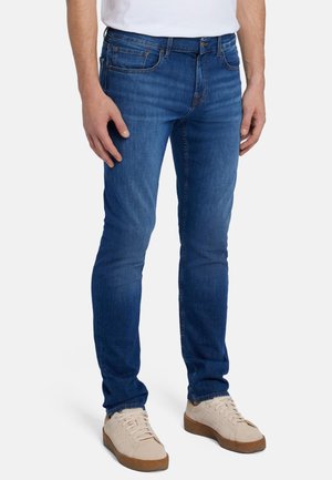 Slim-fit blue jeans made of denim, featuring standard pockets, a button closure, and slight fading along the legs.