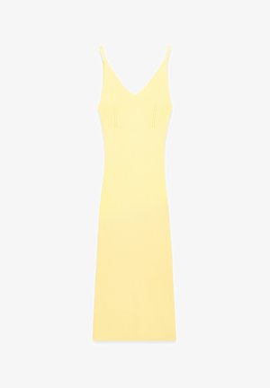 Spleciona żółta sukienka z dekoltem w kształcie V i cienkimi ramiączkami. Posiada szczegóły na szwach bocznych oraz dopasowany krój. Tkanina ma gładką fakturę.