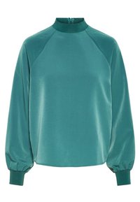 Blusa in satin teal con colletto alto, maniche lunghe a raglan e polsini arricciati. Texture liscia con una leggera lucentezza. Presenta una zip sul retro.