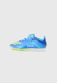 Bright blue soccer cleat with yellow accents and "MESSI" branding, featuring a sleek design and standard lace-up closure.