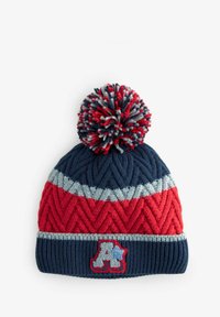 Knit beanie featuring a red, navy, and gray zigzag pattern, topped with a multicolored pom-pom and an embroidered letter "A" patch.