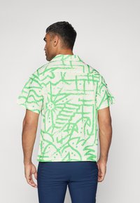 Nike Performance BRASIL BOWLING BUTTON UP - Vapaa-ajan kauluspaita - alabaster/light green spark/deep royal blue