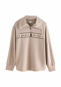 Beige leichter Pullover mit einem Reißverschlusskragen, geripptem Material und schwarzem Branding über der Brust. Mit gefallenen Schultern und langen Ärmeln.