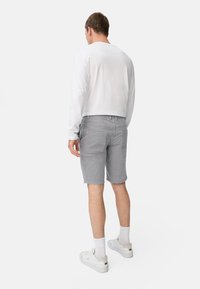 camel active RELAXED FIT - Shorts - tinted blue