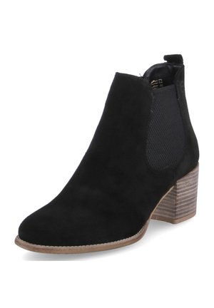 Bottine en daim noir avec bout arrondi, panneaux élastiques latéraux et talon en bois empilé. Texture lisse et design minimaliste.