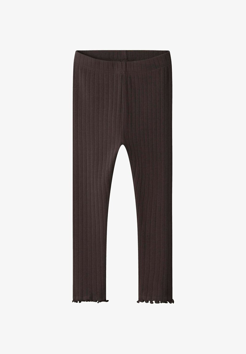 Bruine geribbelde legging met een zachte textuur en een flared zoom. Heeft een elastische tailleband en een aansluitend ontwerp voor comfort.