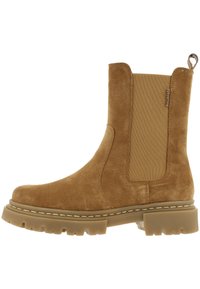 Hnědá semišová kotníková bota s elastickými bočními panely, robustní podrážkou a švovými detaily. Má poutko pro snadné nazouvání.