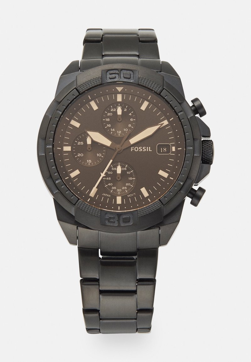 Fossil zwart metalen chronograafhorloge met een bruine wijzerplaat, drie subdialen, zilveren accenten en een solide schakelarmband. Datumaanduiding op 3 uur.