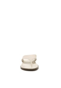 Beige thong sandal with a textured upper strap, flat sole, and contrasting yellow stitching. Minimalist design with a smooth finish.