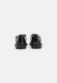 Love Moschino Belebújós cipők - nero