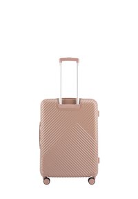 Hartschalentrolley in sanftem Rosa, mit diagonaler Rippenstruktur, einem Teleskopgriff und vier Rädern für Stabilität und Mobilität.