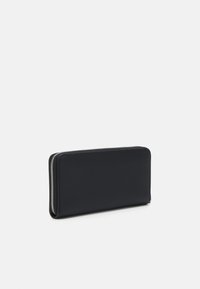 Calvin Klein Jeans SCULPTED ZIP AROUND DEBOSS - Lommebok - black