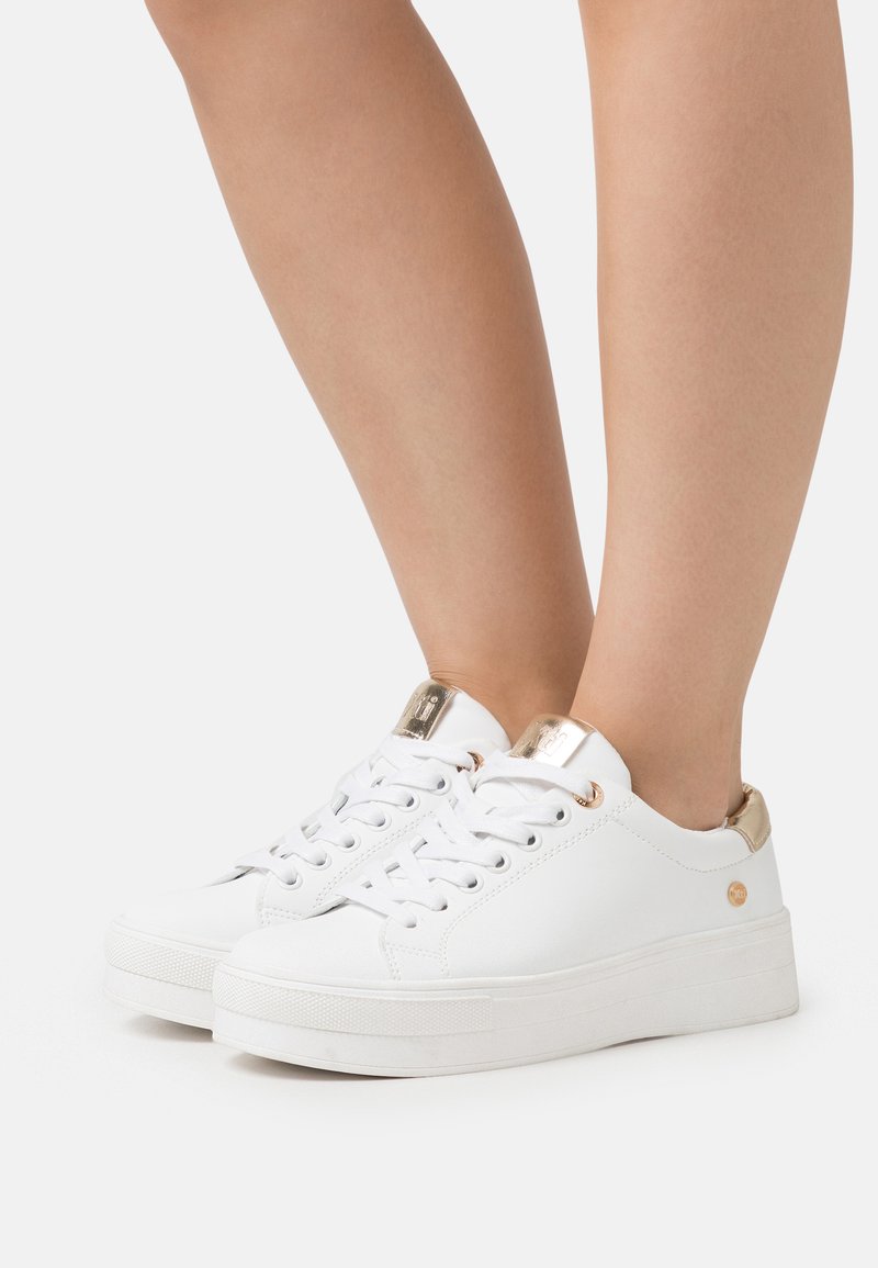 xti grey trainers
