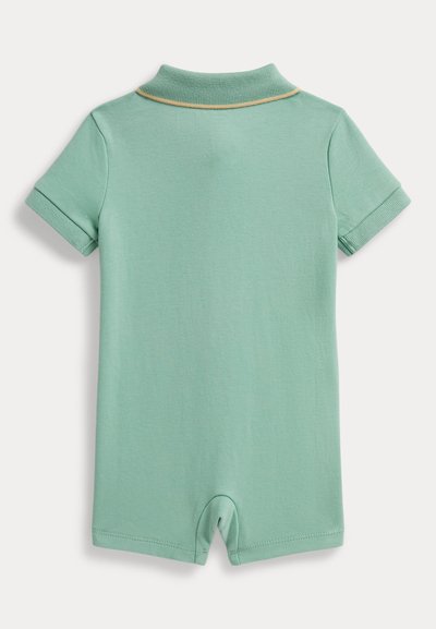 Σορτς ολόσωμη φόρμα σε μέντα πράσινο με κοντά μανίκια από απαλό βαμβάκι. Διαθέτει γιακά με κίτρινη διακόσμηση και άνοιγμα στα πόδια για εύκολη εφαρμογή. Λείο υλικό.