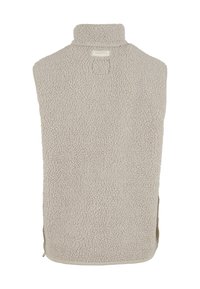 Beige fleece vest with a high collar and textured fabric. Side zippers for ease of wear, featuring a rounded hem and no closures.