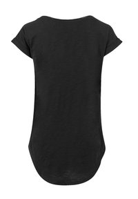 Black short-sleeve top made of a soft, lightweight fabric. Features a rounded neckline and a slightly longer back hem with a relaxed fit.