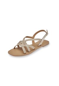 Flatsandalen in beige met gevlochten banden, open teenontwerp, verstelbare enkelriem en een gladde, matte zool met minimale stiksels.