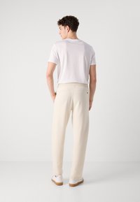 BOSS DONETTO - Pantalon de survêtement - open white