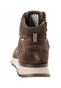 Brauner Wildleder-Wanderstiefel mit hohem Schaft, gelben Akzenten und kontrastierendem gestreiften Zuglasche. Dicke Gummisohle für gute Trittfestigkeit.