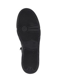 Semelle de chaussure noire avec des motifs de semelle circulaires et linéaires, taille 37 marquée près du centre, dotée d'une petite fermeture éclair sur le côté.