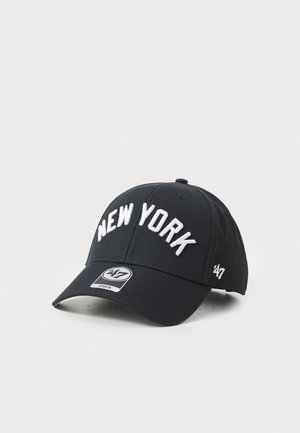 Black baseball cap with embroidered "NEW YORK" in white, featuring a curved brim and logo tag. Material is cotton or similar fabric.