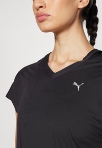 Puma STUDIO FASHION TEE REGULAR - Sportska majica - black