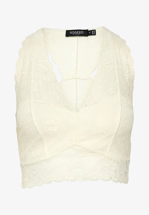 Lace bralette in off-white featuring a floral pattern, scalloped edges, deep V-neck, and a soft, textured finish.