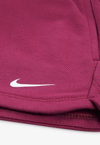 Nike Performance NKG NP ESSENTIALS FT SHORT UNISEX - Short de sport - sweet beet